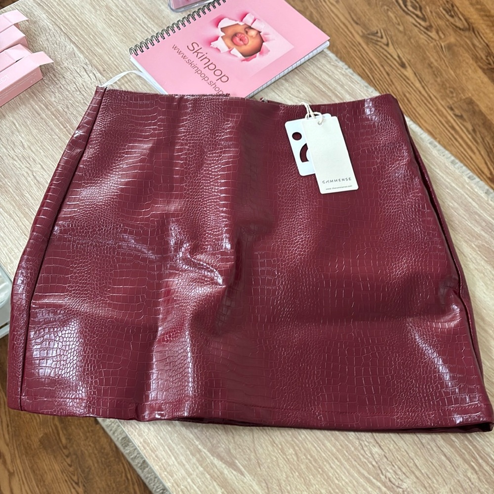 Brand new burgundy croc. mini skirt